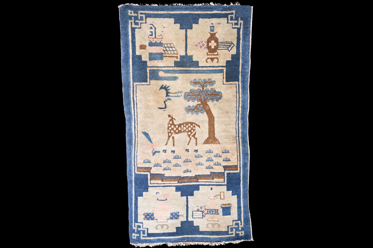Qing Chinese saddle rug with precious objects